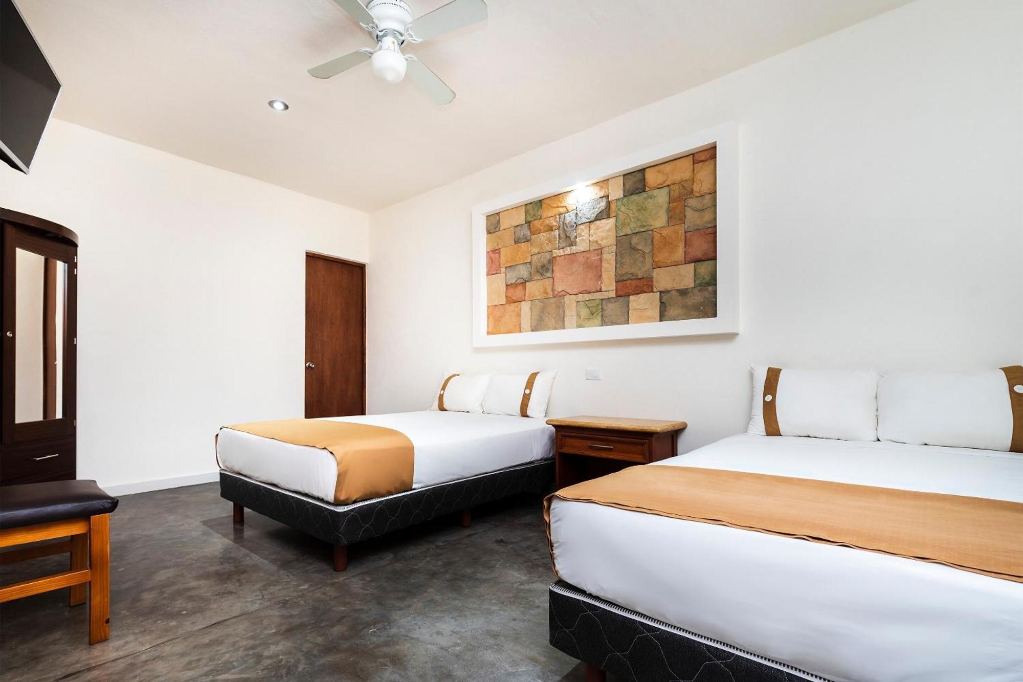 Capital O Hotel Joyma Suites, San Luis サン・ルイス・ポトシ エクステリア 写真