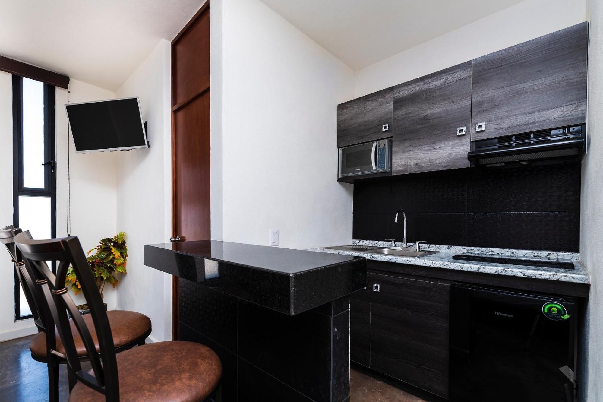Capital O Hotel Joyma Suites, San Luis サン・ルイス・ポトシ エクステリア 写真