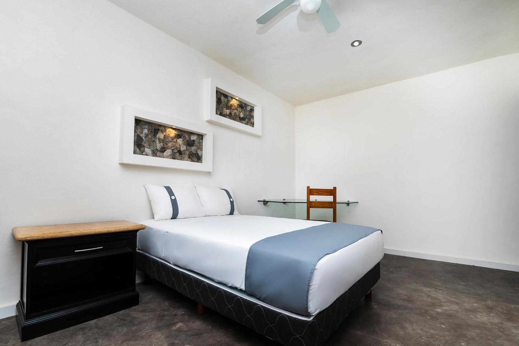 Capital O Hotel Joyma Suites, San Luis サン・ルイス・ポトシ エクステリア 写真
