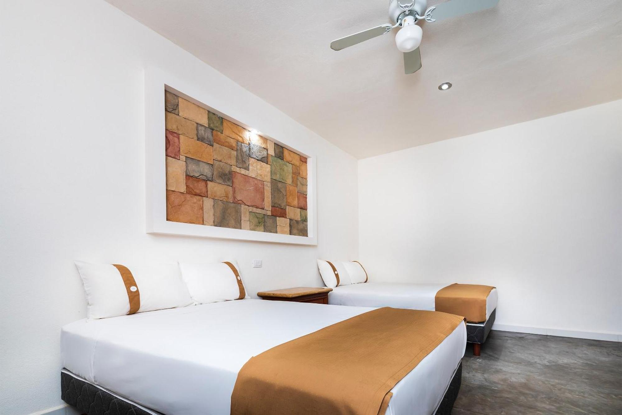 Capital O Hotel Joyma Suites, San Luis サン・ルイス・ポトシ エクステリア 写真