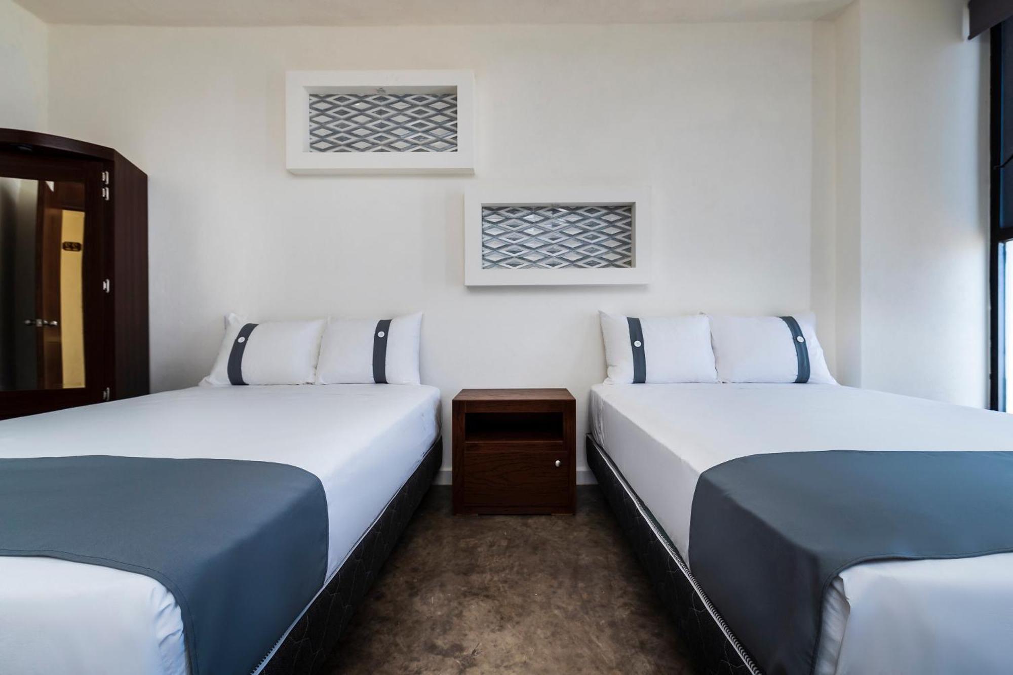 Capital O Hotel Joyma Suites, San Luis サン・ルイス・ポトシ エクステリア 写真