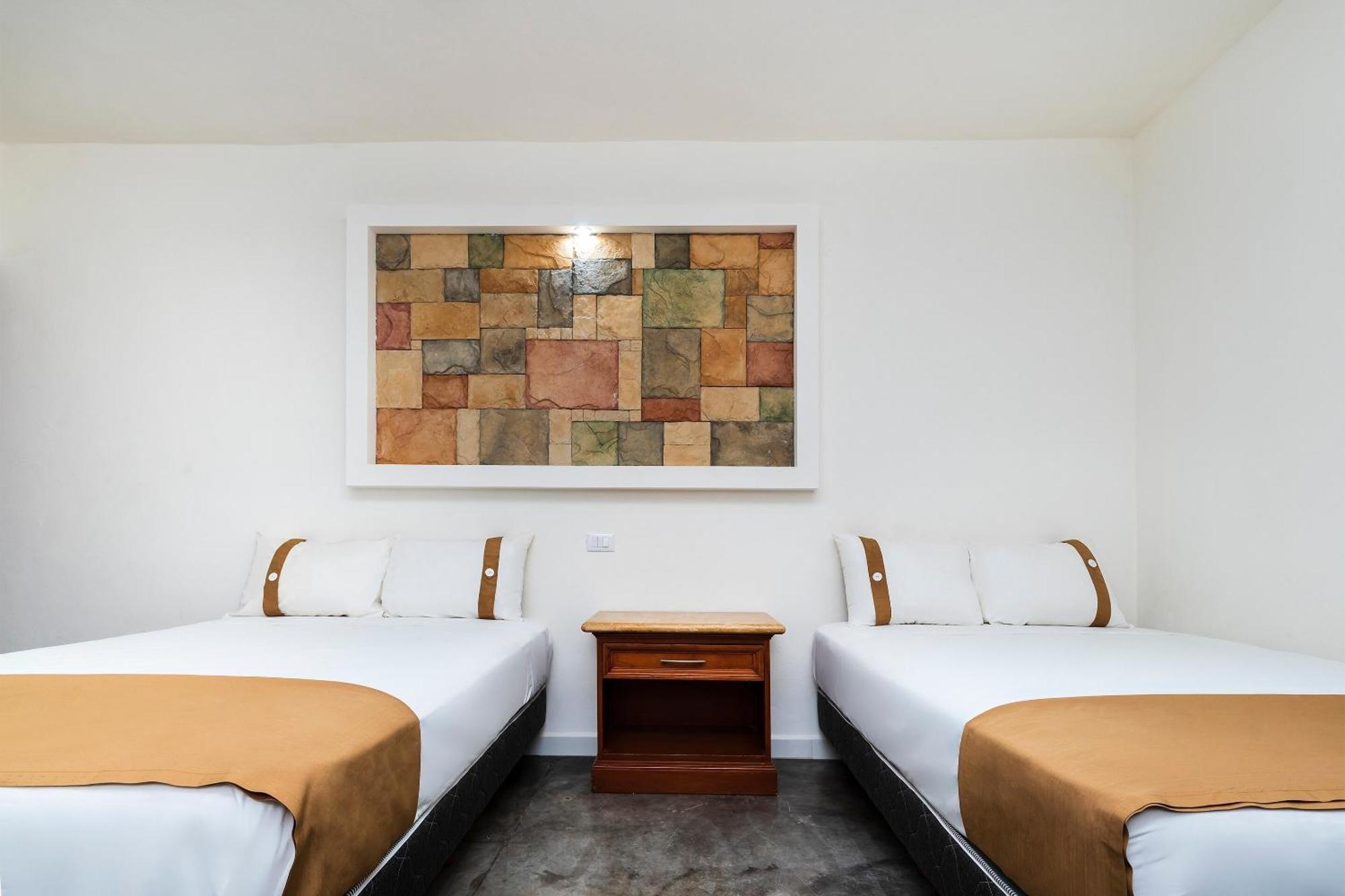 Capital O Hotel Joyma Suites, San Luis サン・ルイス・ポトシ エクステリア 写真