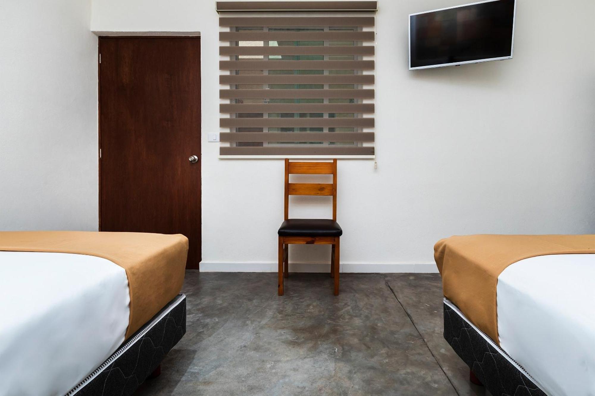 Capital O Hotel Joyma Suites, San Luis サン・ルイス・ポトシ エクステリア 写真