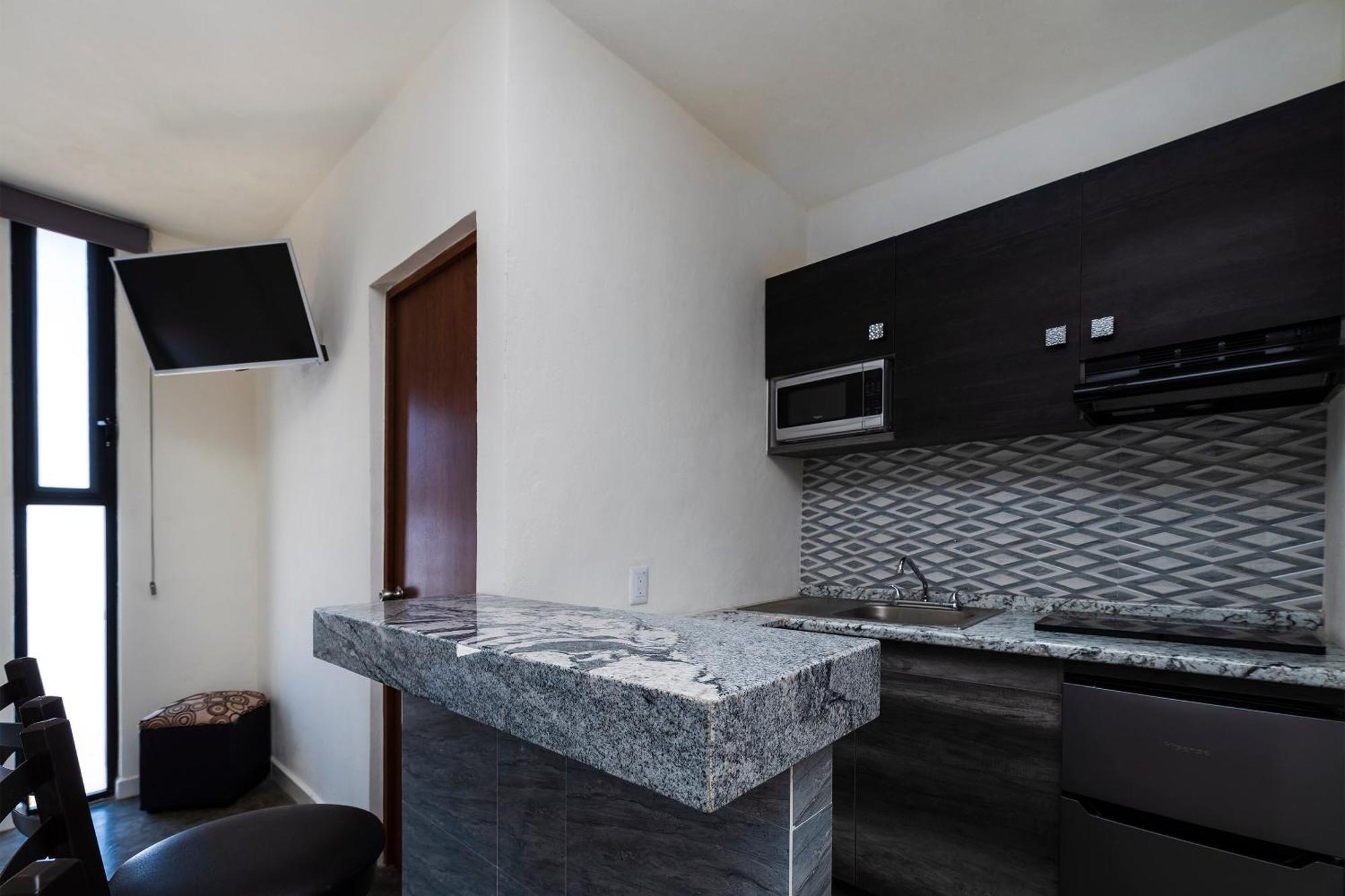 Capital O Hotel Joyma Suites, San Luis サン・ルイス・ポトシ エクステリア 写真