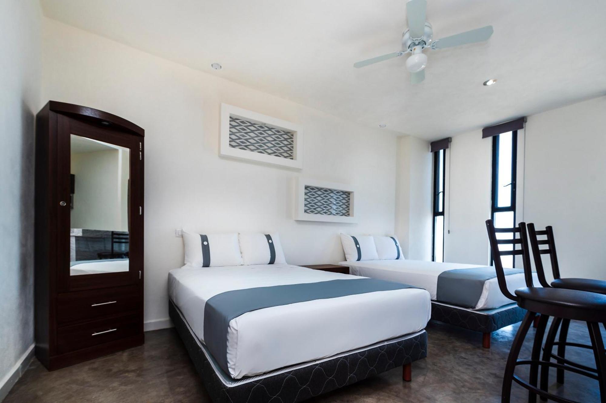 Capital O Hotel Joyma Suites, San Luis サン・ルイス・ポトシ エクステリア 写真