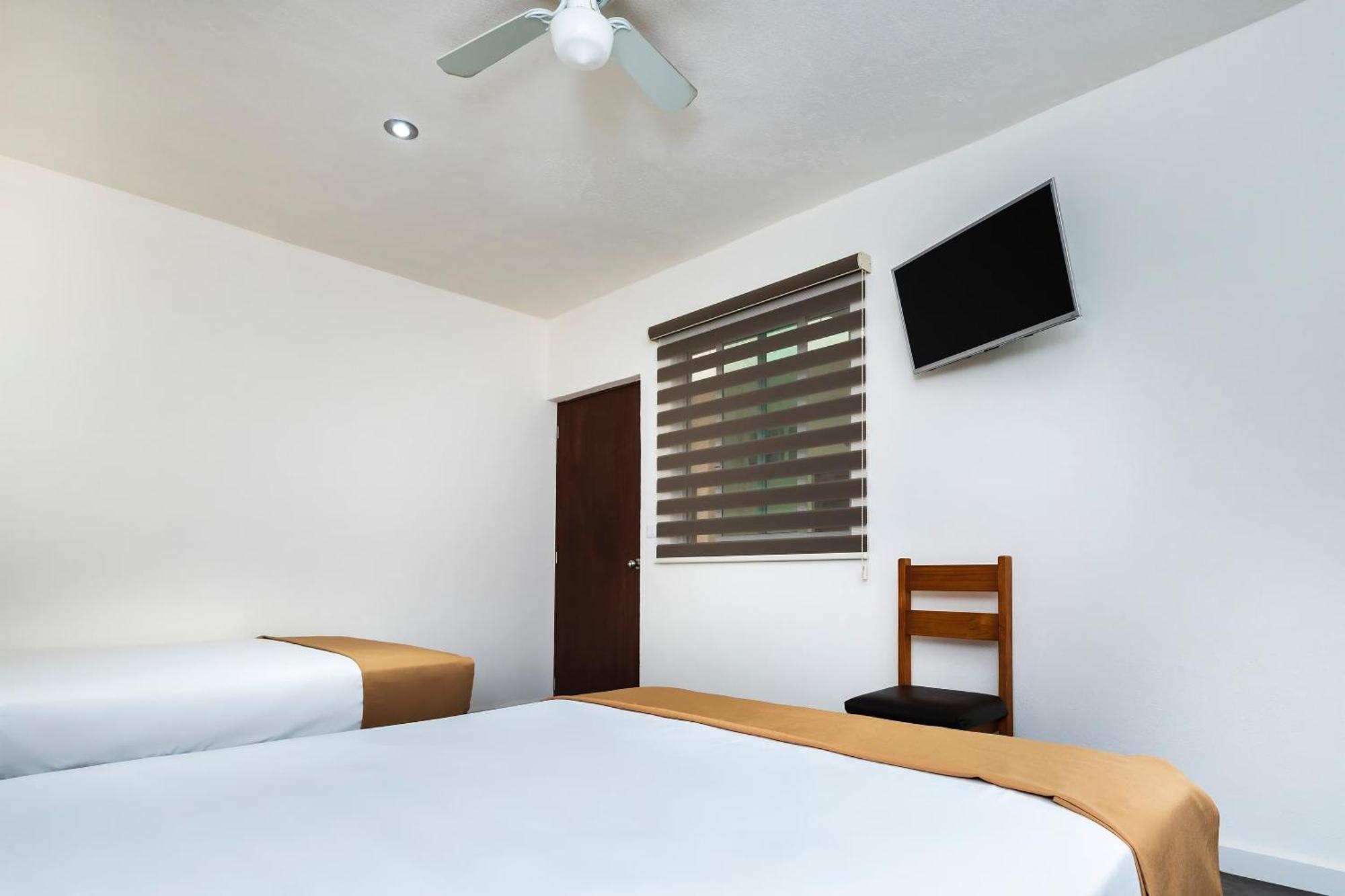 Capital O Hotel Joyma Suites, San Luis サン・ルイス・ポトシ エクステリア 写真