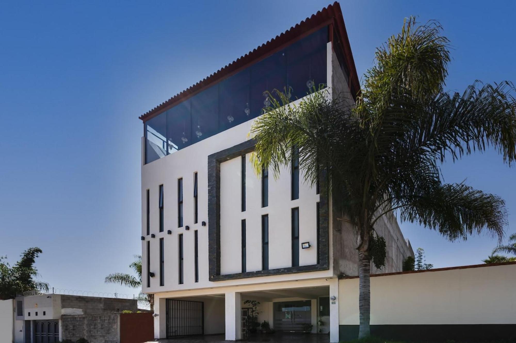 Capital O Hotel Joyma Suites, San Luis サン・ルイス・ポトシ エクステリア 写真